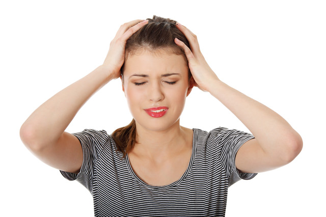 Teen woman with headache