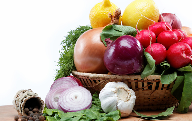 Healthy food. Fresh vegetables and fruits on a wooden board.