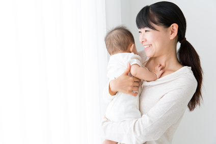 asian baby and mother relaxing