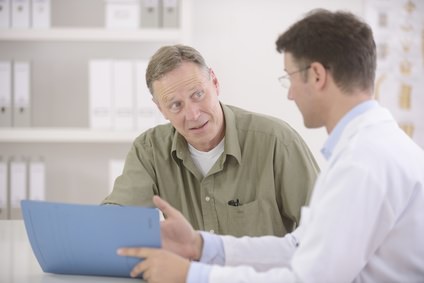 Doctor talking to patient