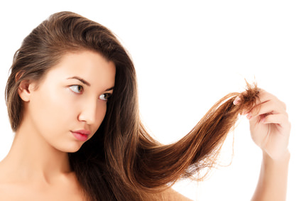 woman is not happy with her fragile hair, white background