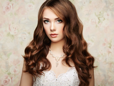 Portrait of beautiful sensual woman with elegant hairstyle. Wedd