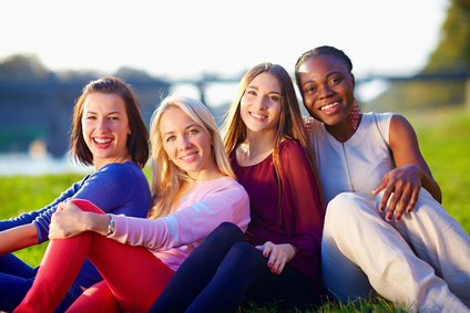 group of happy miltiracial friends, outdoors