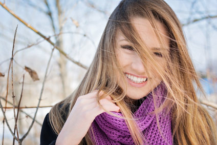 Gorgeous happy young woman winter portrait outdoors